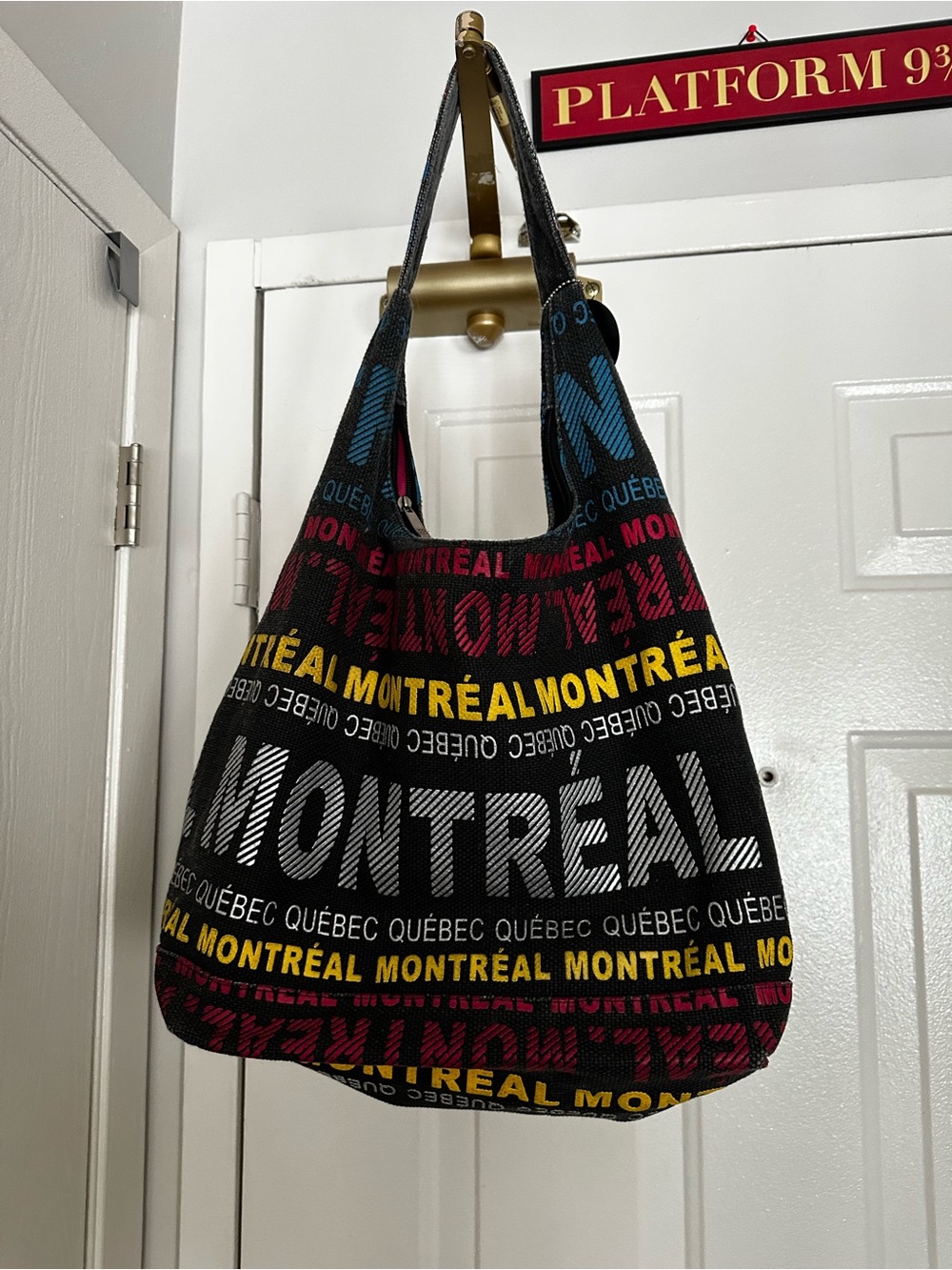 Robin Ruth Black Hobo Bag with Multicolor Montreal Text